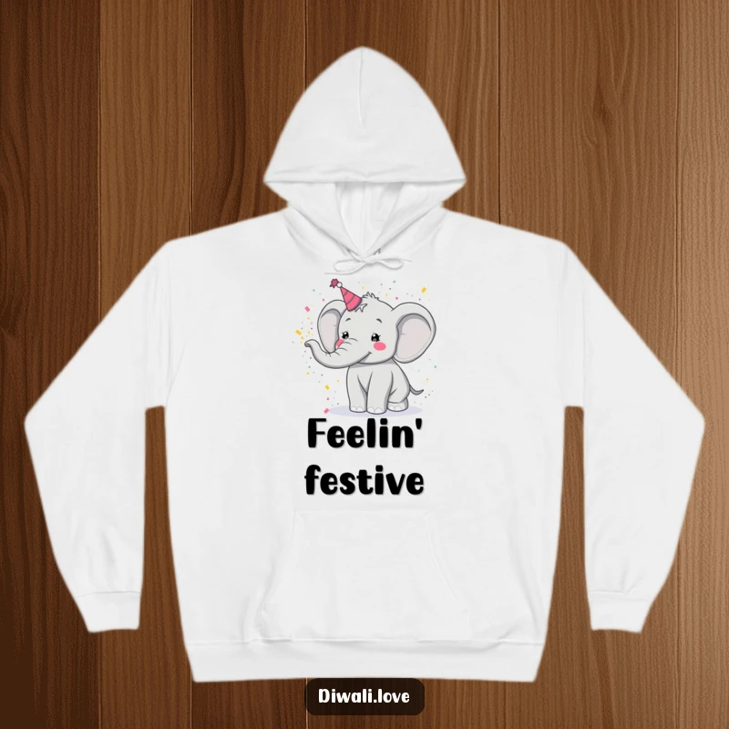 Funny hoodie: A joyful elephant enthusiastically tossing vibrant Holi powder, spreading cheer and color.