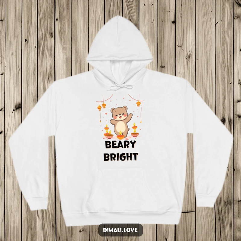Funny hoodie: A playful bear dancing merrily amidst a warm glow of floating diyas, perfect for celebrations.