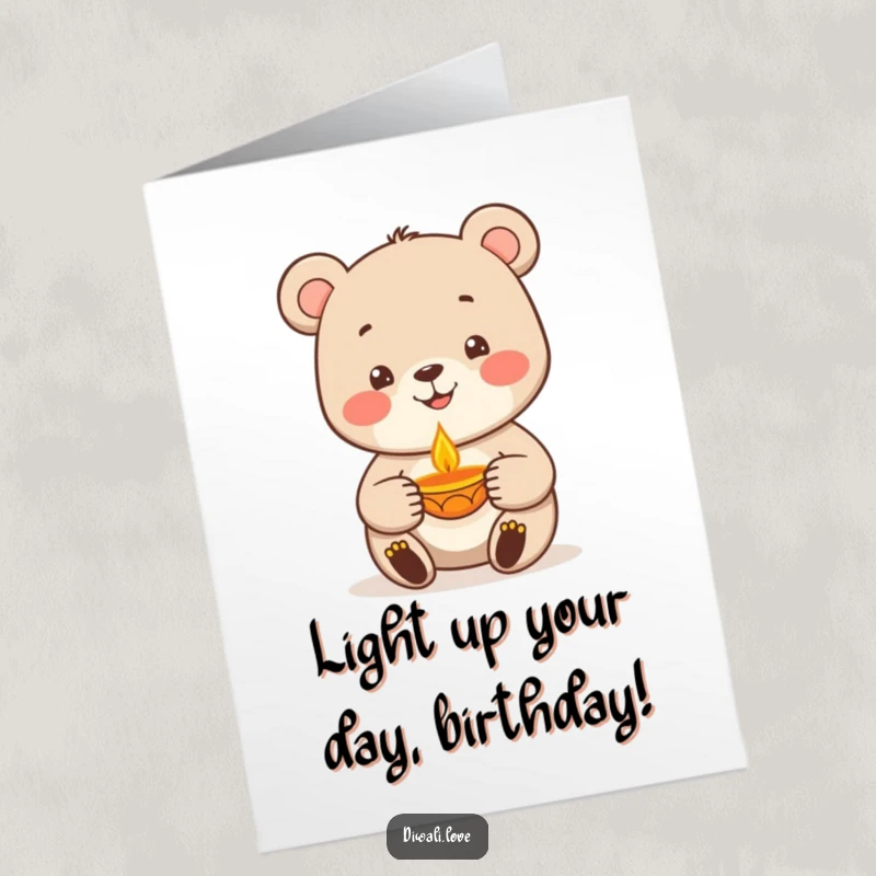 Funny Free Printable Birthday Card: Happy bear holds a diya lamp with a warm flickering flame, ready for a birthday wish.