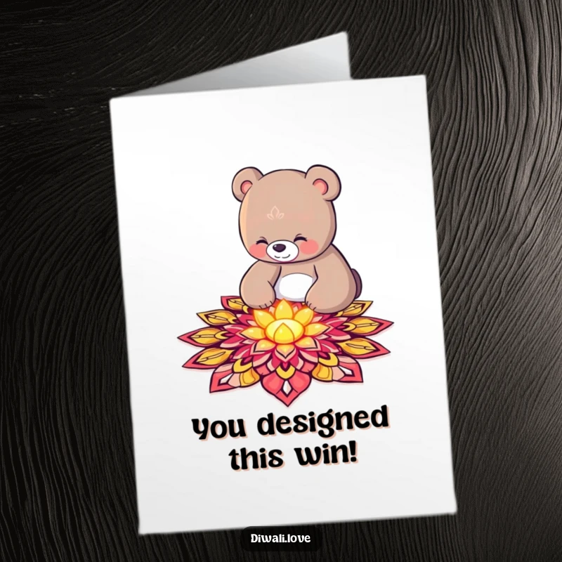 Funny Free Printable Congratulations Card showing a curious bear meticulously decorating a rangoli pattern with luminous petals.